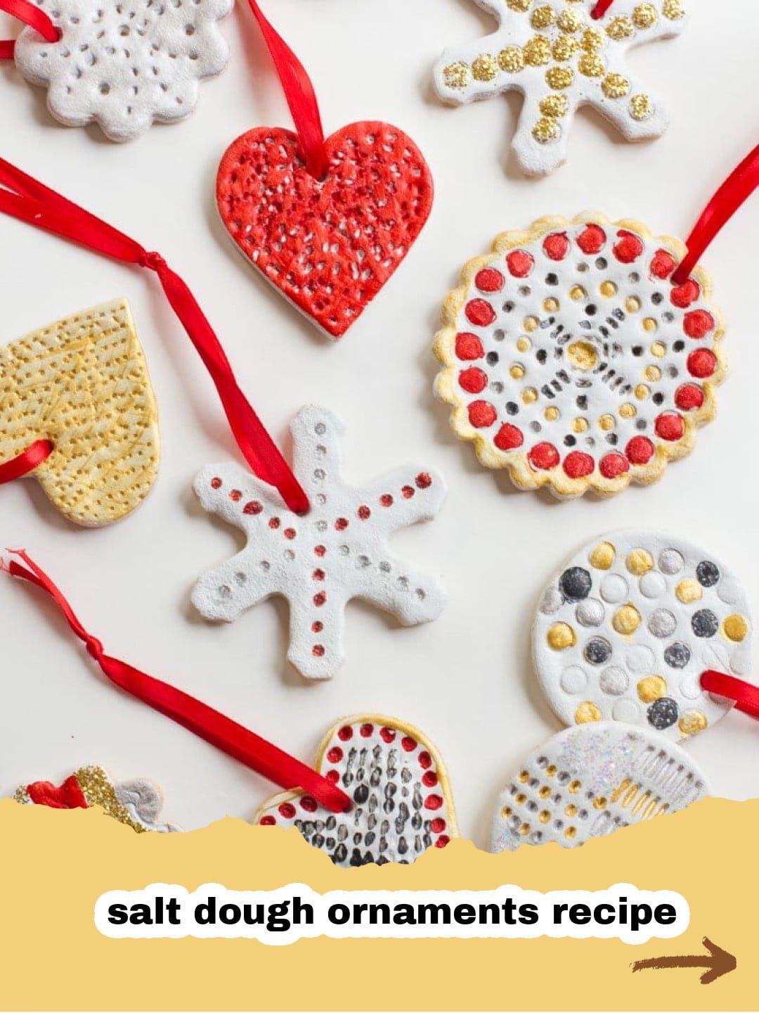 Crafting Memories: The Ultimate Salt Dough Recipe for Ornaments, Handprints, and Crafting Fun! 1 Assortment of finished salt dough ornaments including a handprint, star, and heart, painted and decorated, lying on a wooden surface.