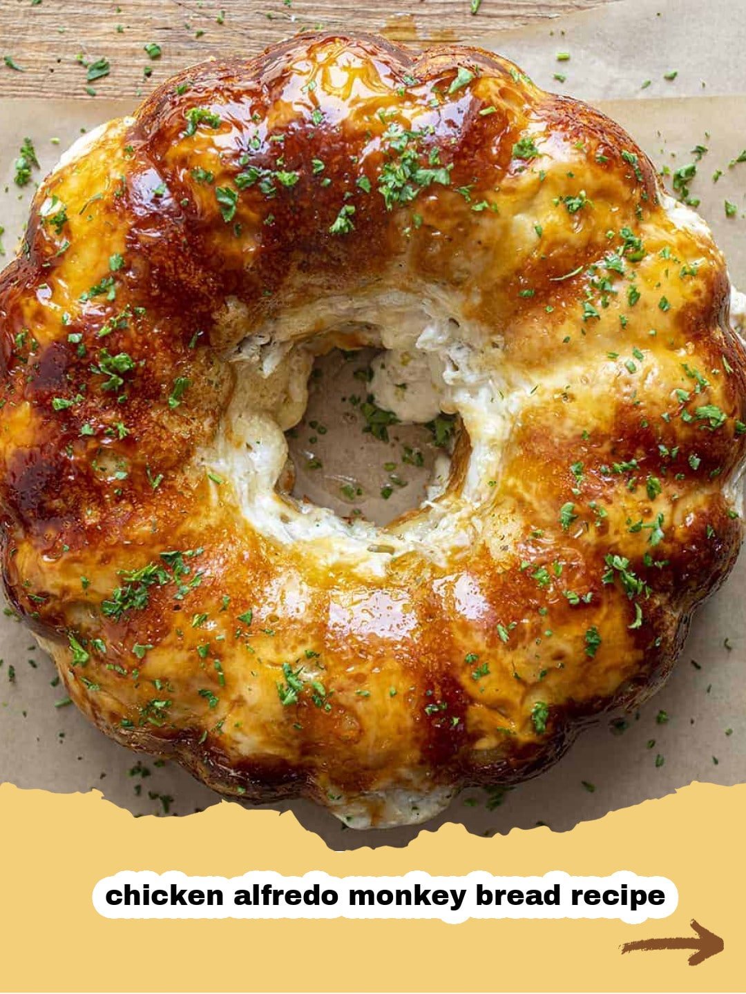Chicken Alfredo Monkey Bread: The Ultimate Savory Pull-Apart Dinner 1 Savory pull-apart Chicken Alfredo Monkey Bread in a bundt pan, garnished with fresh parsley.