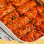 Platter of freshly baked Easy Cabbage Rolls garnished with fresh parsley.