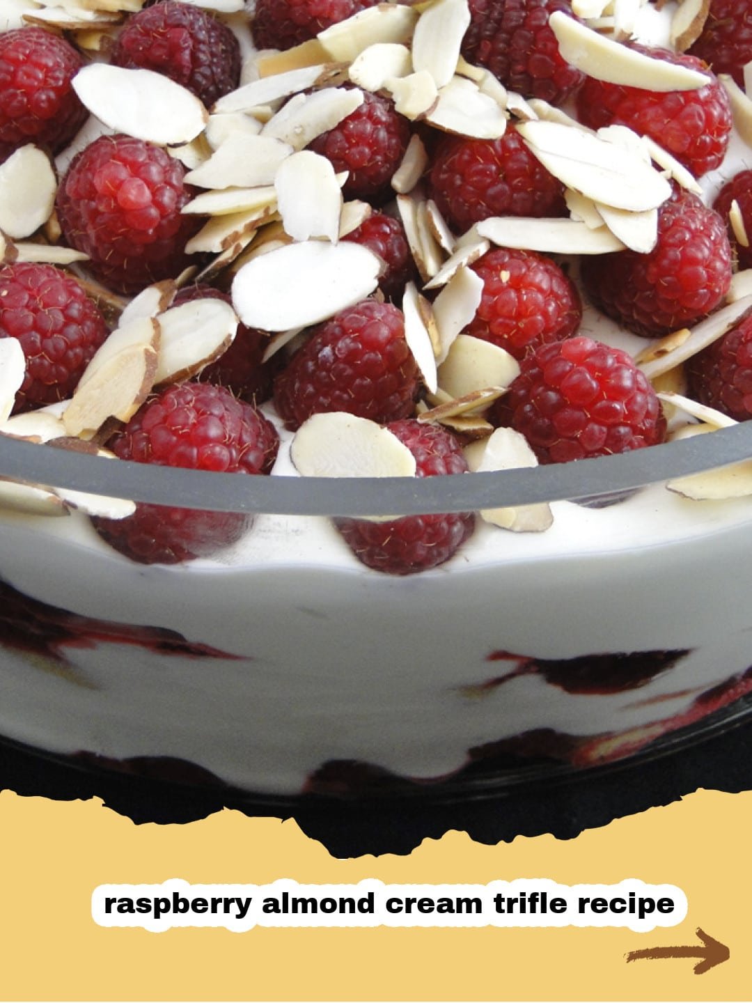 The Dreamy Raspberry and Almond Trifle: A Symphony of Summer Flavors 1 A beautifully layered raspberry and almond trifle in a clear glass bowl, garnished with fresh raspberries and toasted almonds.