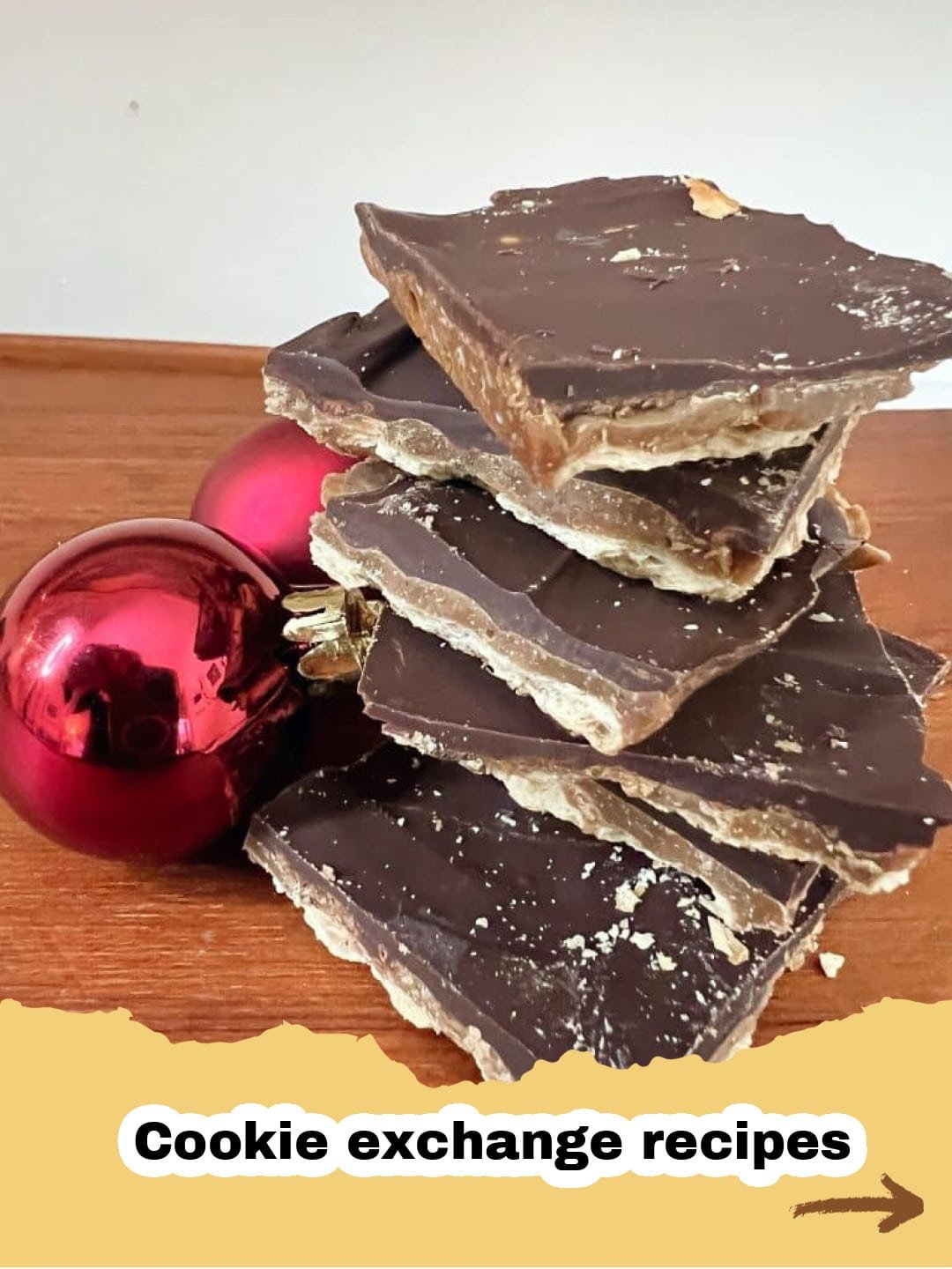 The Irresistible Magic of Julia's Christmas Crack: A Holiday Tradition You Need! 1 Close-up of Julia's Christmas Crack with a golden toffee base, melted chocolate, and a sprinkle of flaky sea salt, broken into irregular pieces.