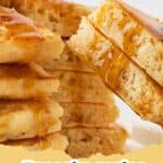 Stack of golden fluffy pancakes with butter and maple syrup on a white plate