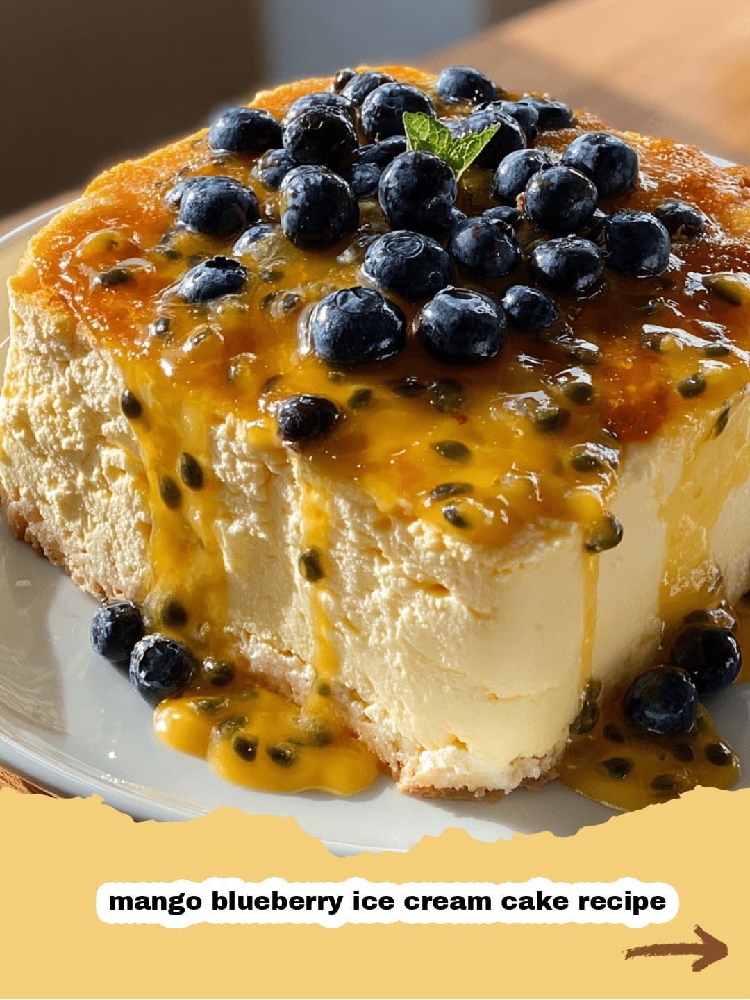 The Ultimate Summer Indulgence: Mango Blueberry Ice Cream Cake Recipe You Will Love! 1 Slice of Mango Blueberry Ice Cream Cake on a white plate, garnished with fresh mint and blueberries, showing distinct layers of crunchy crust, creamy mango, and tart blueberry swirl.