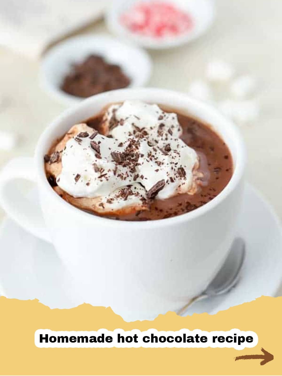 The Best Homemade Hot Chocolate You'll Ever Make 1 A steaming mug of homemade hot chocolate topped with whipped cream and chocolate shavings.