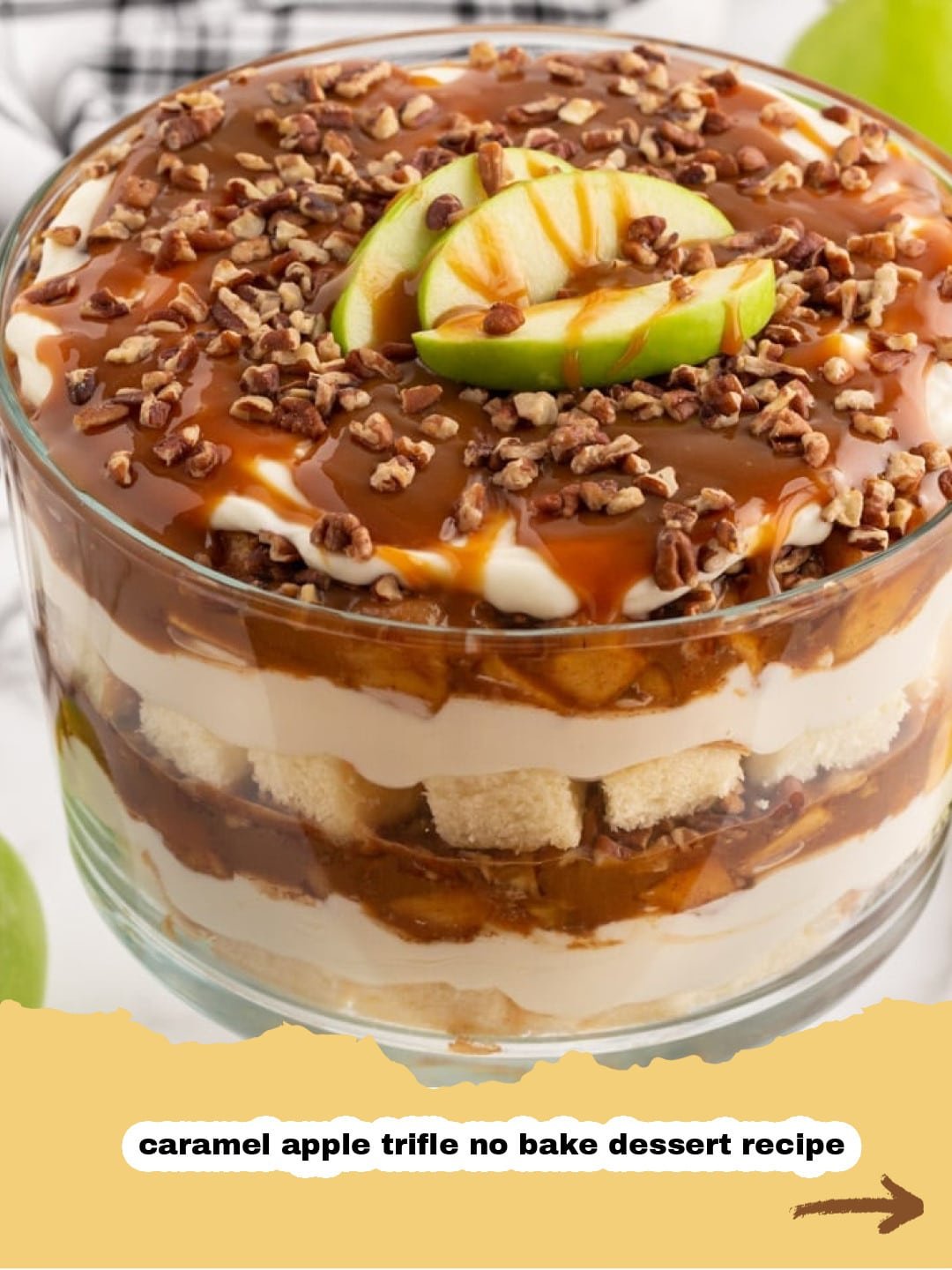Caramel Apple Cheesecake Trifle: A No-Bake Fall Masterpiece 1 Beautifully layered Caramel Apple Cheesecake Trifle in a glass bowl, garnished with whipped cream, caramel drizzle, and pecans.