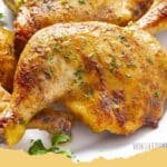 A platter of perfectly roasted Baked Chicken Leg Quarters (Crispy & Juicy) with golden brown skin.