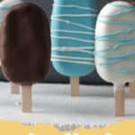 A row of colorful decorated cakesicles on a white plate