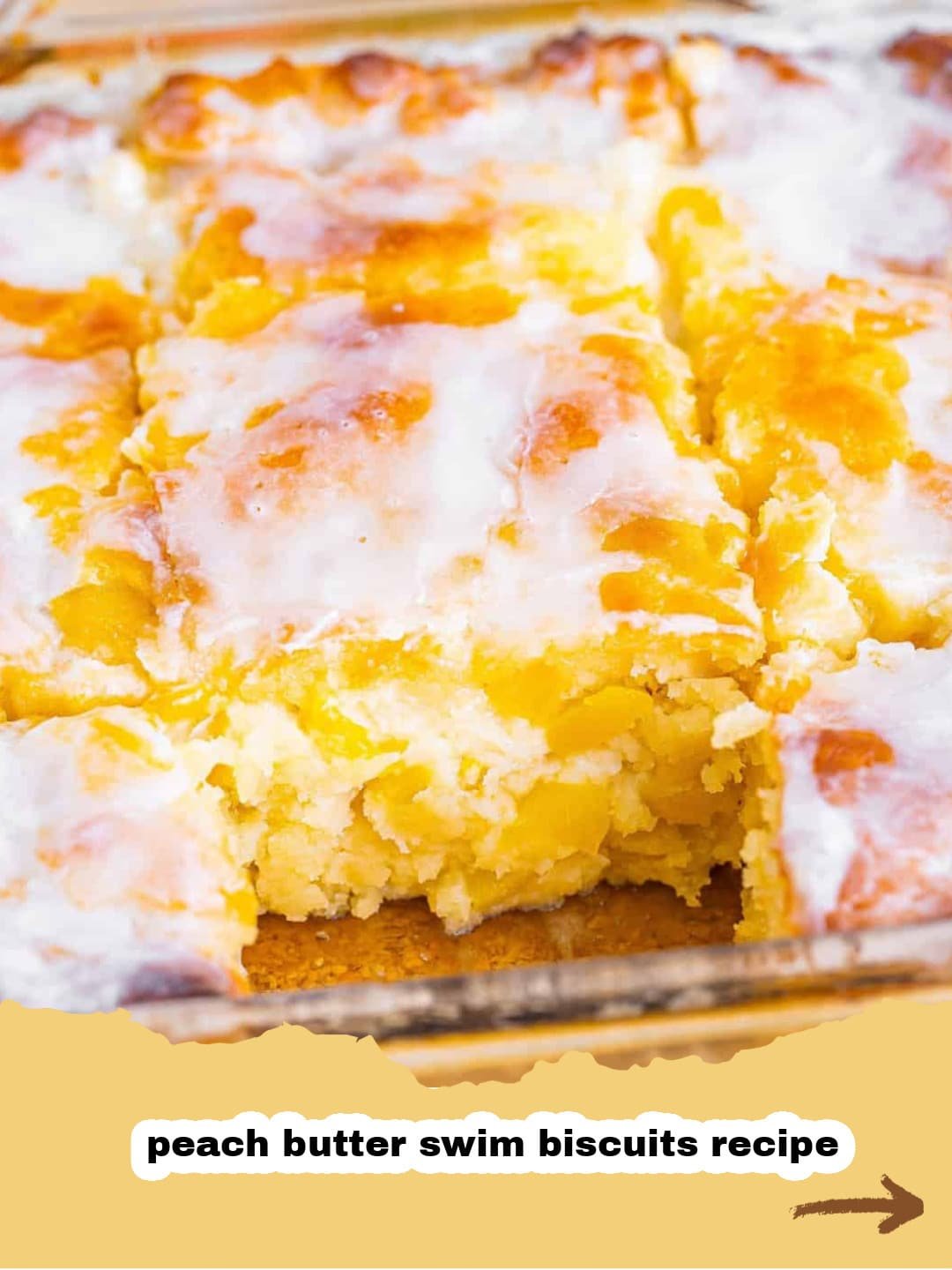 The Easiest & Most Delicious Peach Butter Swim Biscuits You'll Ever Make! 1 Golden brown Peach Butter Swim Biscuits in a baking dish, with juicy peach pieces visible on top.