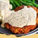 Golden brown chicken fried steak with creamy white gravy