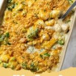 A golden brown Chicken Divan casserole in a glass baking dish